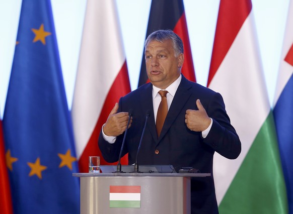 Hungary&#039;s Prime Minister Viktor Orban speaks during the news conference in Warsaw, Poland, August 26, 2015. REUTERS/Kacper Pempel