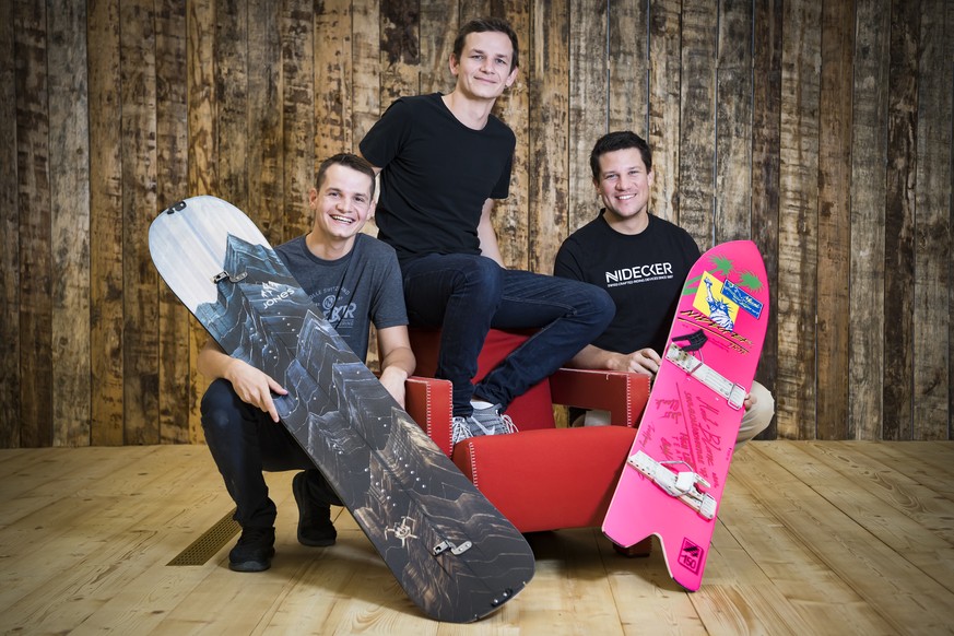 Les trois freres Cedric, Xavier, Henry Nidecker posent dans l&#039;entreprise Nidecker, specialisee dans le Snowboard ce vendredi 12 octobre 2018 a Rolle. (KEYSTONE/Jean-Christophe Bott)