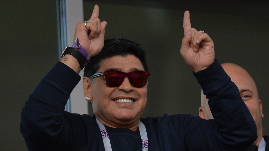 epa06812922 Argentinian soccer legend Diego Maradona is seen in the stands before the FIFA World Cup 2018 group D preliminary round soccer match between Argentina and Iceland in Moscow, Russia, 16 Jun ...