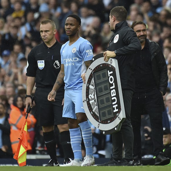 Manchester City&#039;s Raheem Sterling gets ready to come on as a substitute during the English Premier League soccer match between Manchester City and Norwich City at Etihad stadium in Manchester, En ...