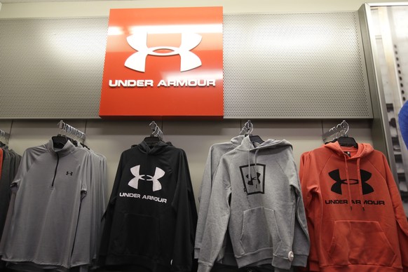 FILE - In this Nov. 29, 2019, file photo Under Armour clothes are displayed at a Kohl&#039;s store in Colma, Calif. Sportswear company Under Armour has settled with the Securities and Exchange Commiss ...