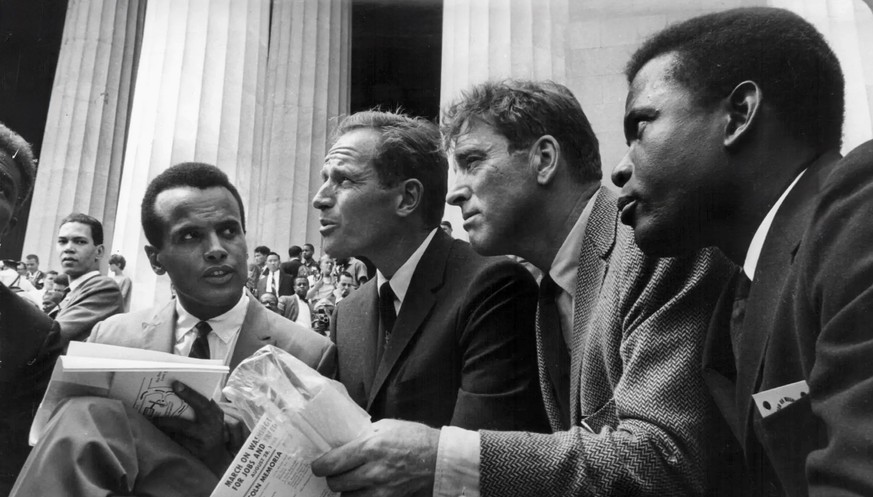 Harry Belafonte, Charlton Heston, Burt Lancaster and Sidney Poitier during The March on Washington for Jobs and Freedom (commonly known as the March on Washington or the Great March on Washington) was ...