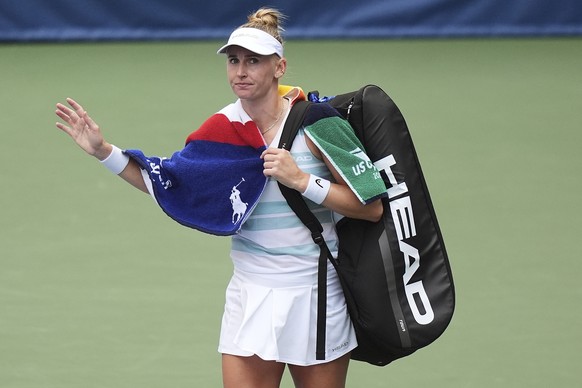 Jil Teichmann, of Switzerland, walks off the court after losing to Caty McNally, of the United States, during the first round of the US Open tennis championships, Sunday, Aug. 24, 2025, in New York. ( ...