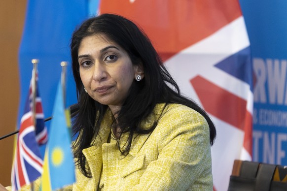 British Home Secretary Suella Braverman pauses during a press conference in Rwanda's capital Kigali, Saturday, March 18, 2023. Braverman arrived in Rwanda on Saturday for a visit aimed at re...