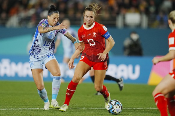 Spain&#039;s Jennifer Hermoso, left, and Switzerland&#039;s Lia Waelti battle for the ball during the Women&#039;s World Cup second round soccer match between Switzerland and Spain at Eden Park in Auc ...