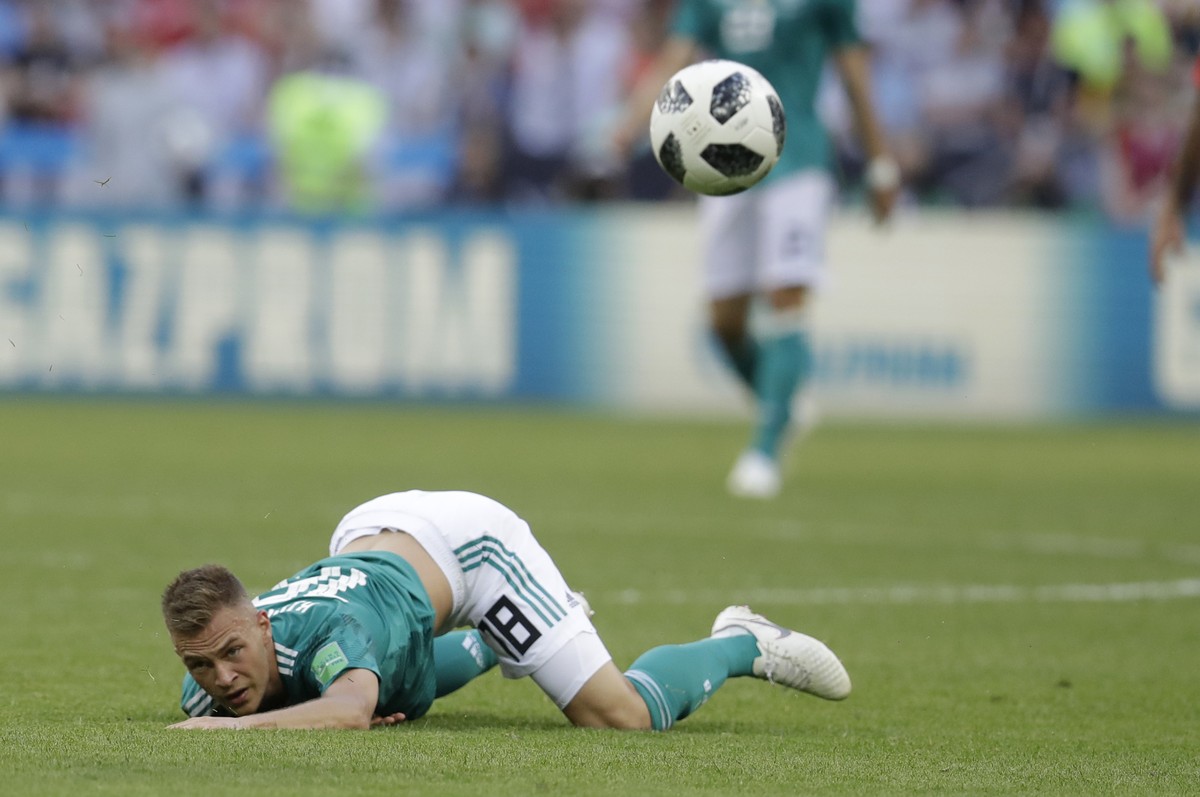 Germany's Joshua Kimmich watches the ball while sitting on the pitch during the group F match between South Korea and Germany, at the 2018 soccer World Cup in the Kazan Arena in Kazan, Russia, We ...