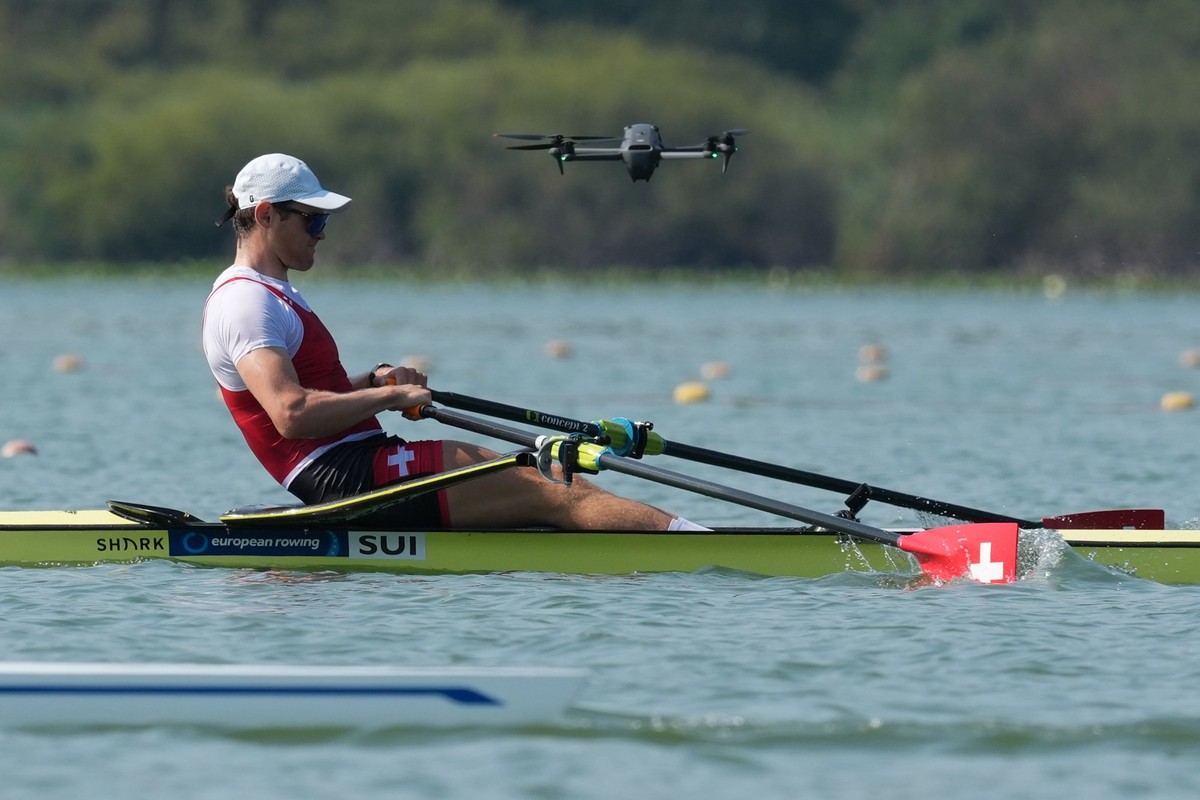 Switzerland's Kai Schaetzle competes during the Men's Single Sculls Semifinal 2 at the European Rowing Championships in Varese, northern Italy, Saturday, Aug.1, 2026. (AP Photo/Antonio Calan ...