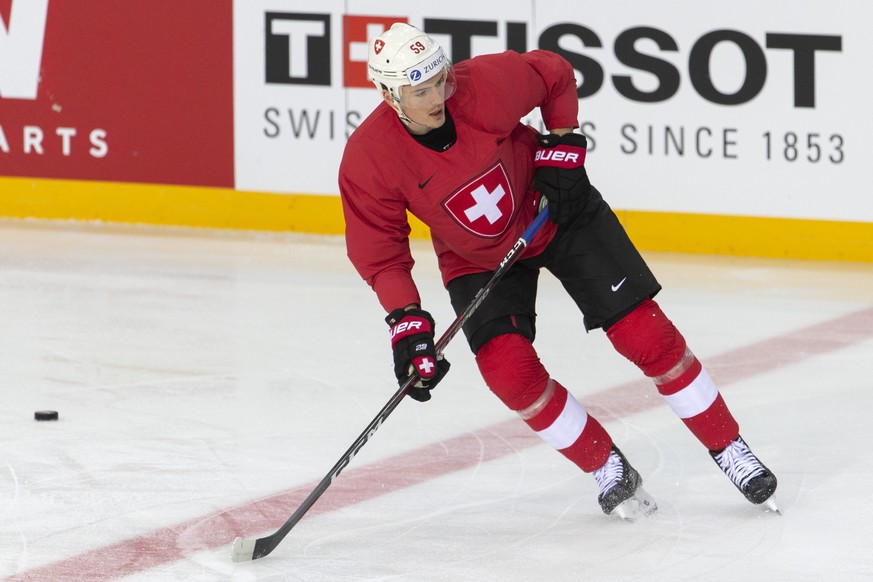 Switzerland&#039;s forward Dario Simion skates, during a Switzerland team training session at the IIHF 2021 World Championship, at the Olympic Sports Center, in Riga, Latvia, Saturday, May 22, 2021. ( ...