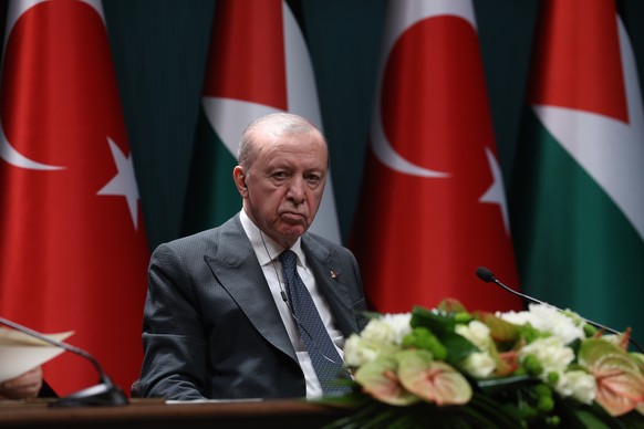 epa13164027 Turkish President Recep Tayyip Erdogan and Palestinian President Mahmoud Abbas (not pictured) attend a press conference following their meeting in Ankara, Turkey, 12 August 2026. Abbas is  ...