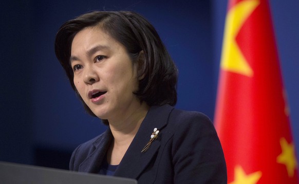 FILE - In this Jan. 6, 2016, file photo, Chinese Foreign Ministry spokeswoman Hua Chunying speaks during a briefing at the Chinese Foreign Ministry in Beijing. China has denied a New York Times report ...