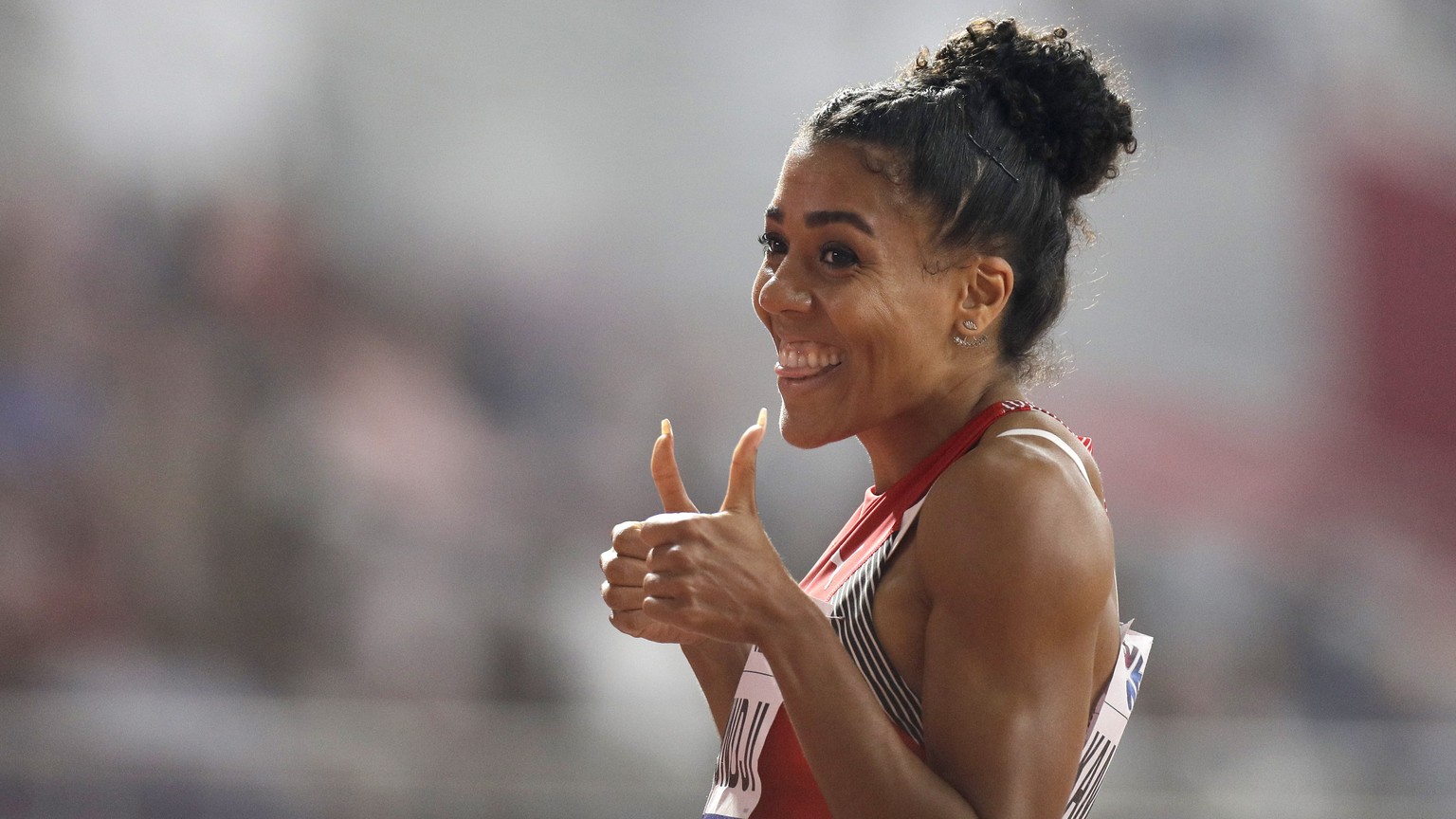 Mujinga Kambundji, of Switzerland, gestures after a women&#039;s 200 meter semifinal at the World Athletics Championships in Doha, Qatar, Tuesday, Oct. 1, 2019. (AP Photo/Petr David Josek)