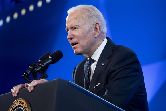 epa09700772 US President Joe Biden delivers remarks at the United States Conference of Mayors 90th Winter Meeting, in Washington, DC, USA, 21 January 2022. EPA/MICHAEL REYNOLDS