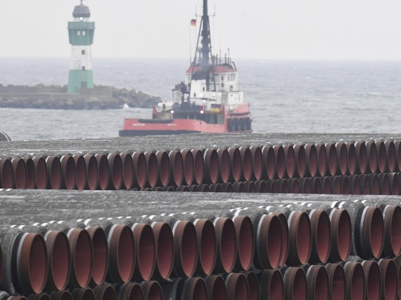 Pipes for the Nord Stream 2 Baltic Sea gas pipeline are stored on the premises of the port of Mukran near Sassnitz, Germany, on Dec. 4, 2020. Russia&#039;s natural gas pipeline to Europe is built and  ...