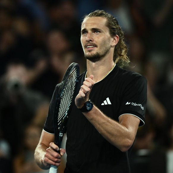 epa12674203 Alexander Zverev of Germany celebrates after winning the Mens 3rd round match against Cameron Norrie of Great Britain on day six of the 2026 Australian Open tennis tournament in Melbourne ...