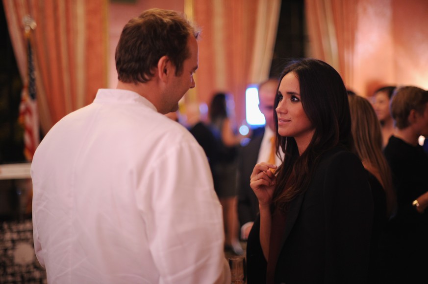 NEW YORK, NY - OCTOBER 01: Meghan Markle (R) and chef Daniel Humm attend RELAIS &amp; CHATEAUX 60th Anniversary Guest Chef Dinner Launch at Consulate General of France on October 1, 2014 in New York C ...