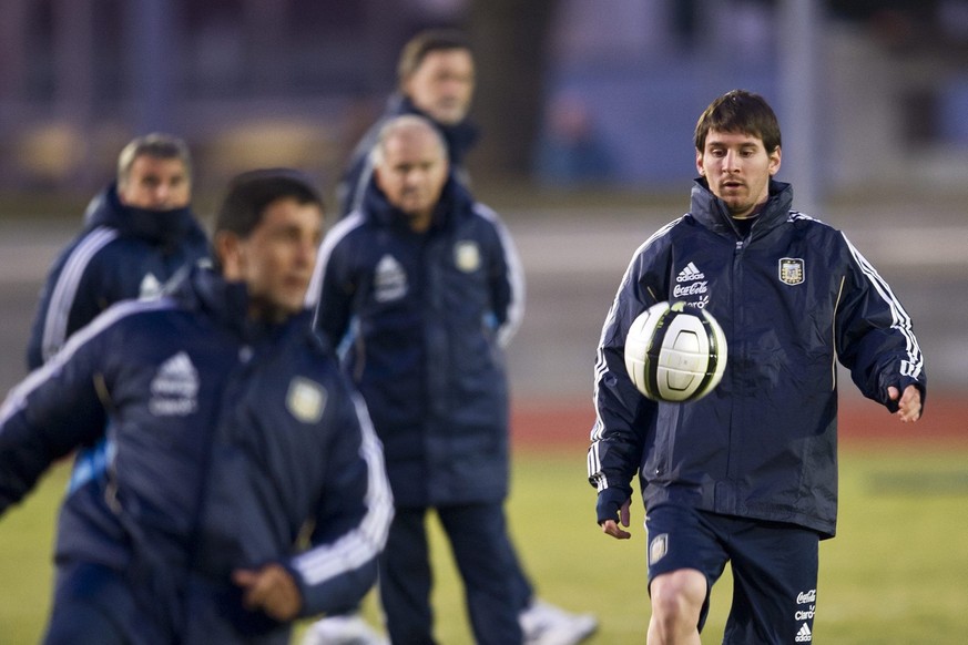 FC Barcelona's striker Lionel Messi, right, attends a training session with the Argentinian team in Bern, Switzerland, Monday, February 27, 2012. Argentina is meeting Switzerland in a friendly so ...