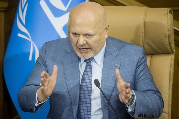 epa11294950 Prosecutor of the International Criminal Court (ICC), Karim Khan, speaks during a meeting with Attorney General of Venezuela, Tarek William Saab, and the President of the National Assembly ...
