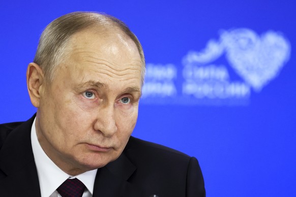 Russian President Vladimir Putin attends a meeting with municipal heads in Russia's states during the Russian Municipal Forum "Small Motherland - the strength of Russia ...
