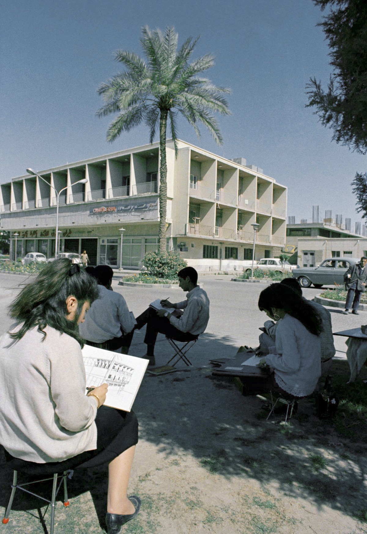 Student's of Baghdad's engineering school making drawings of a Baghdad, Iraq street on Nov. 11, 1969. (AP Photo)