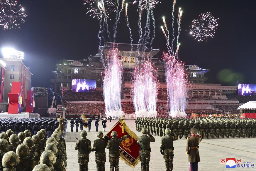 In this photo, provided by the North Korean government, a military parade is held to mark the 75th anniversary of the establishment of the Korean People's Army at Kim Il Sung Square in Pyongyang, North Korea Wednesday...
