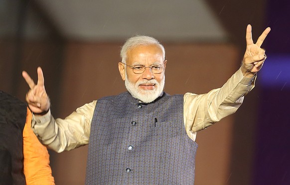 epa07594580  Bhartya Janta Party (BJP) leader and Indian Prime Minister Narendra Modi  gestures a victory sign at the party headquarters in New Delhi, India, 23 May 2019. The Lok Sabha, the lower hous ...