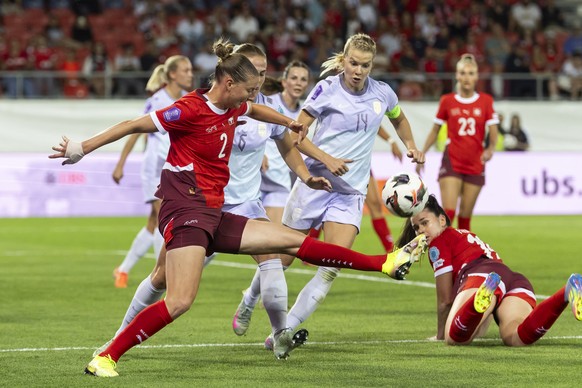 Switzerland&#039;s Defender Julia Stierli, left, fights for the ball with Norway&#039;s Defender Maren Mjelde, center and Norway&#039;s Forward Ada Hegerberg, right, during the UEFA Women&#039;s Natio ...