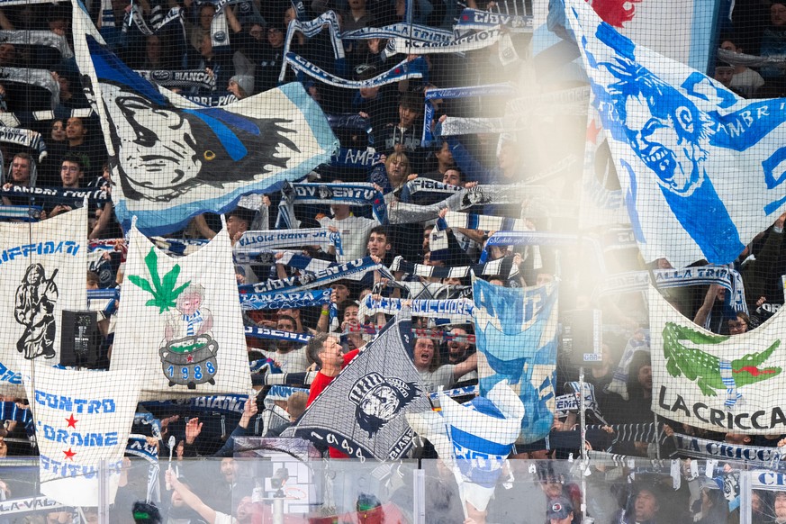 Ambri?s fans sing ?La Montanara after the regular season National League game between HC Ambri Piotta and HC Ajoie at the ice stadium Gottardo Arena in Ambri, Switzerland, Wednesday, January 22, 2025. ...