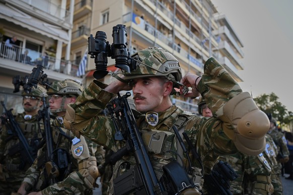 Members of the Greek Army take part at the annual military parade to mark Ochi Day, commemorating Greece's defiance of Fascist Italy that forced it to enter World War II., in Thessaloniki, northe ...