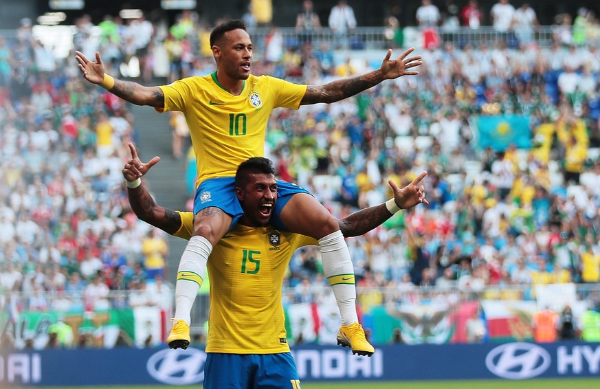 epaselect epa06858223 Neymar (top) of Brazil celebrates with teammate Paulinho after scoring the 1-0 during the FIFA World Cup 2018 round of 16 soccer match between Brazil and Mexico in Samara, Russia ...