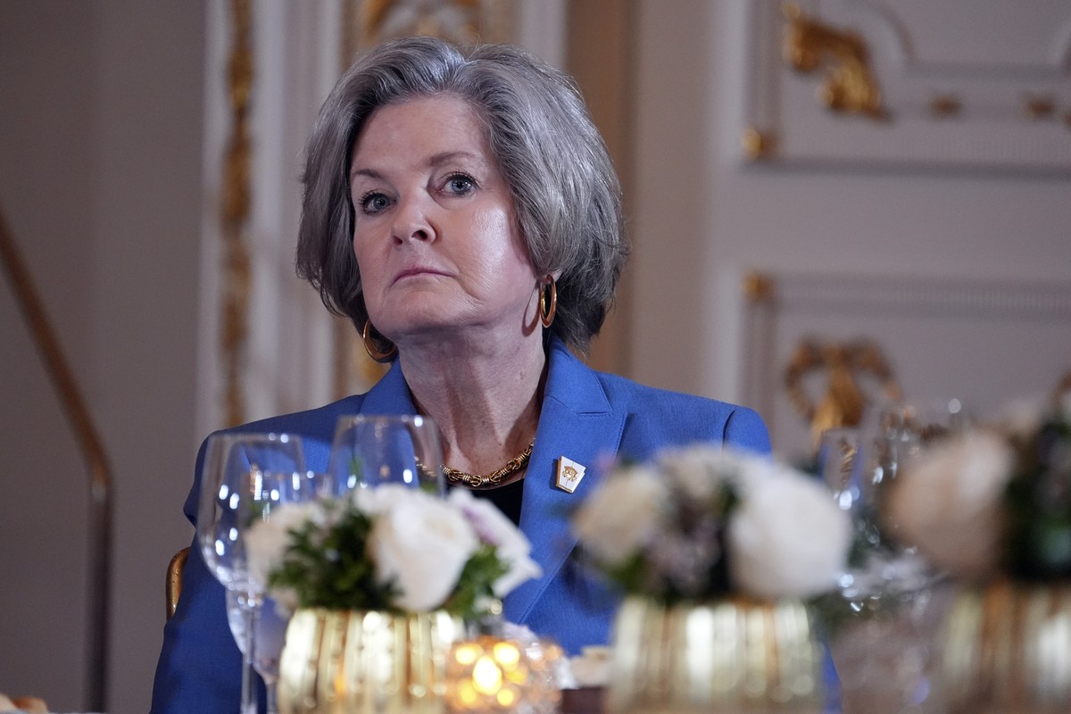 Susie Wiles listens as President-elect Donald Trump speaks during a meeting with Republican governors at Mar-a-Lago, Thursday, Jan. 9, 2025, in Palm Beach, Fla. (AP Photo/Evan Vucci)
