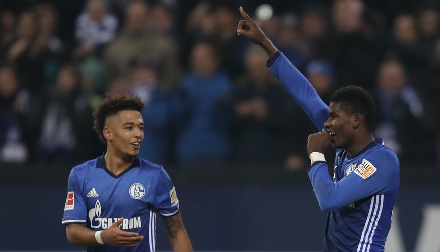 epa06537313 Schalke&#039;s Breel Embolo (R) celebrates with team mate Thilo Kehrer after scoring the 2-0 goal during the German Bundesliga soccer match between FC Schalke 04 and TSG Hoffenheim in Gels ...