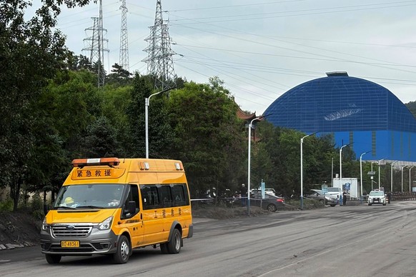 An emergency vehicle is seen leaving from the Liushenyu coal mine facility in Qinyuan county in Changzhi, northern China's Shanxi province on Sunday, May 24, 2026. (AP Photo/E. Eduardo Castillo)
 ...