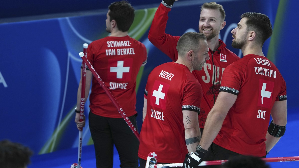 Switzerland's Yannick Schwaller, Schwarz-van Berkel Benoit, Sven Michel, and Pablo Lachat-Couchepin react after the men's curling round robin session against China, at the 2026 Winter Olympi ...