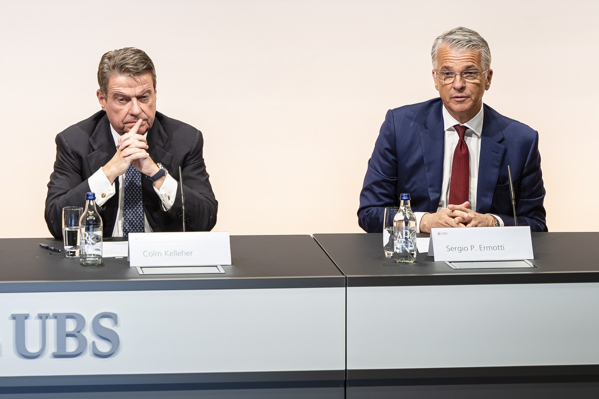 epa10548383 Newly appointed Group Chief Executive Officer of Swiss Bank UBS Sergio P. Ermotti (R) and UBS Chairman Colm Kelleher attend a news conference in Zurich, Switzerland, 29 March 2023. Followi ...