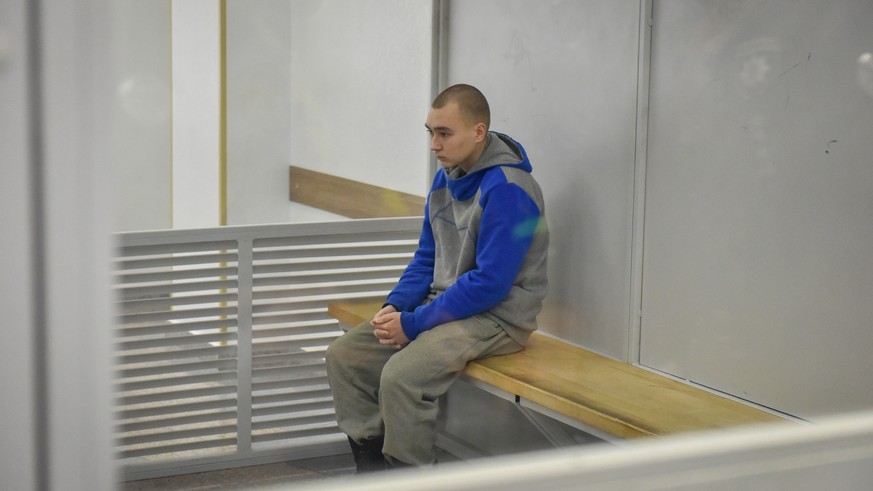 epa09968839 Russian serviceman Vadim Shishimarin attends a court hearing in the Solomyansky district court in Kyiv, Ukraine, 23 May 2022. Russian serviceman Vadim Shishimarin, 21, was sentenced to lif ...