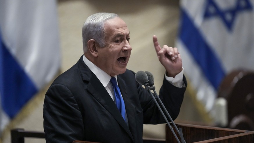 FILE - Former Israeli Prime Minister Benjamin Netanyahu speaks at the Knesset, Israel&#039;s parliament, in Jerusalem, June 30, 2022. Hadas Klein, a key witness in Netanyahu