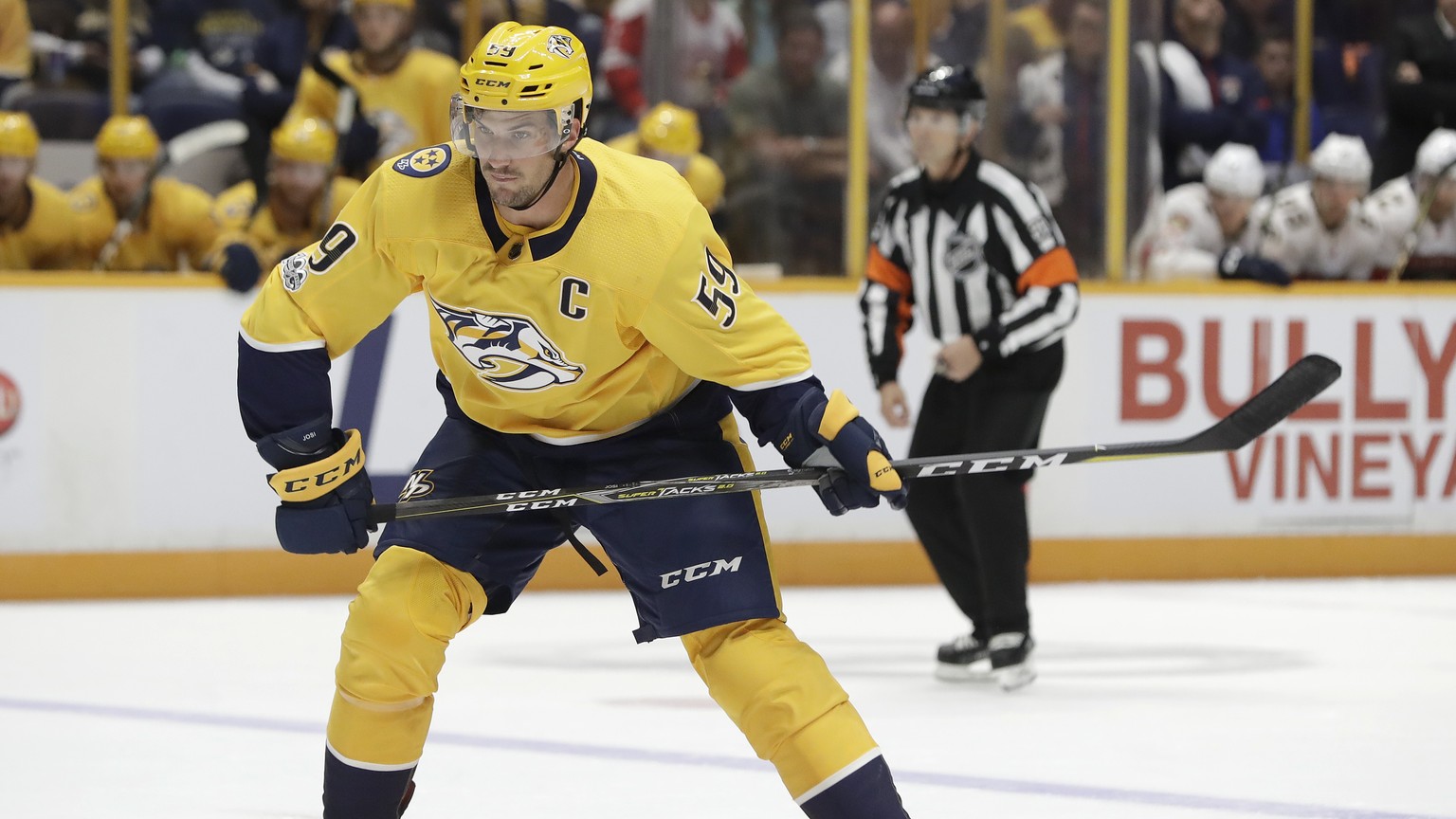 Nashville Predators defenseman Roman Josi, of Switzerland, winds up to shoot against the Florida Panthers during the second period of the second game in an NHL hockey preseason doubleheader Tuesday, S ...