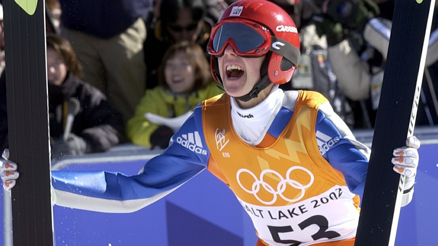 Simon Ammann of Switzerland celebrates his gold medal winning jump after the K90 Individual ski jump at the 2002 Salt Lake City Winter Olympics in Park City, Utah, Sunday, Feb. 10, 2002. (KEYSTONE/Kar ...