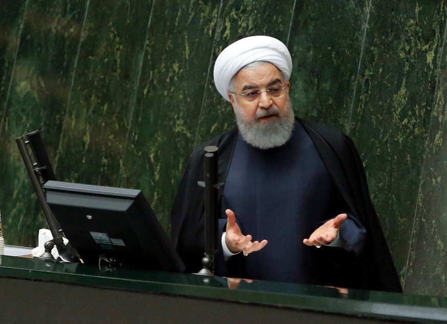 epa06380552 Iranian President Hassan Rouhani delivers his speech to present the Iranian New Year budget during the parliament session in Tehran, Iran, 10 December 2017. Media reported Rouhani said in  ...