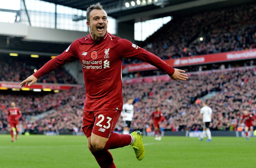 epa07158234 Liverpool&#039;s Xherdan Shaqiri celebrates scoring the second goal making the score 2-0 during the English Premier League soccer match between Liverpool and Fulham at the Anfield in Liver ...