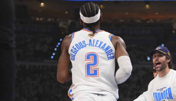 Fans cheer for Oklahoma City Thunder guard Shai Gilgeous-Alexander (2) during the first half of Game 1 of the NBA Finals basketball series against the Indiana Pacers Thursday, June 5, 2025, in Oklahom ...