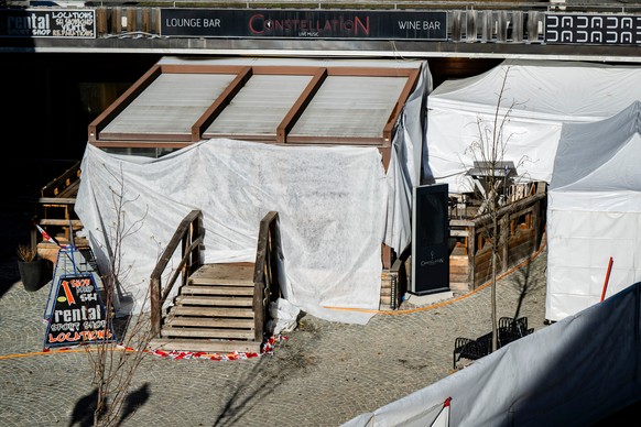 Exterior view of the closed Le Constellation bar in Crans-Montana, Swiss Alps, Switzerland, Sunday, Jan. 4, 2026, after a devastating fire in the bar left dead and injured during the New Year's c ...