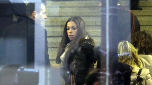 epa03534997 Moroccan-born Karima el-Mahroug (C), also known as Ruby Rubacuori (Ruby Heart Stealer), arrives for a court hearing in the trial of former Italian Prime Minister Silvio Berlusconi in Milan ...