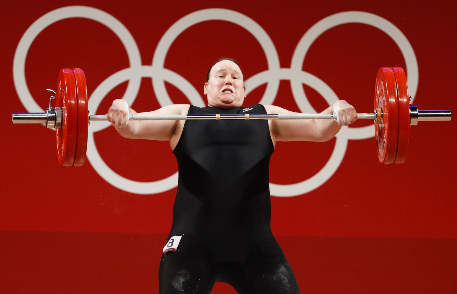 epa09387831 Laurel Hubbard of New Zealand fails to lift 120kg in the first attempt during the Snatch portion of the Women&#039;s +87kg Group A Gold Medal event of the Weightlifting events of the Tokyo ...