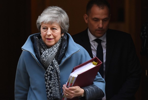 epa07495848 British Prime Minister Theresa May departs 10 Downing Street for parliament in London, Britain, 10 April 2019. British Prime Minister Theresa May is later heading to Brussels seeking an ex ...