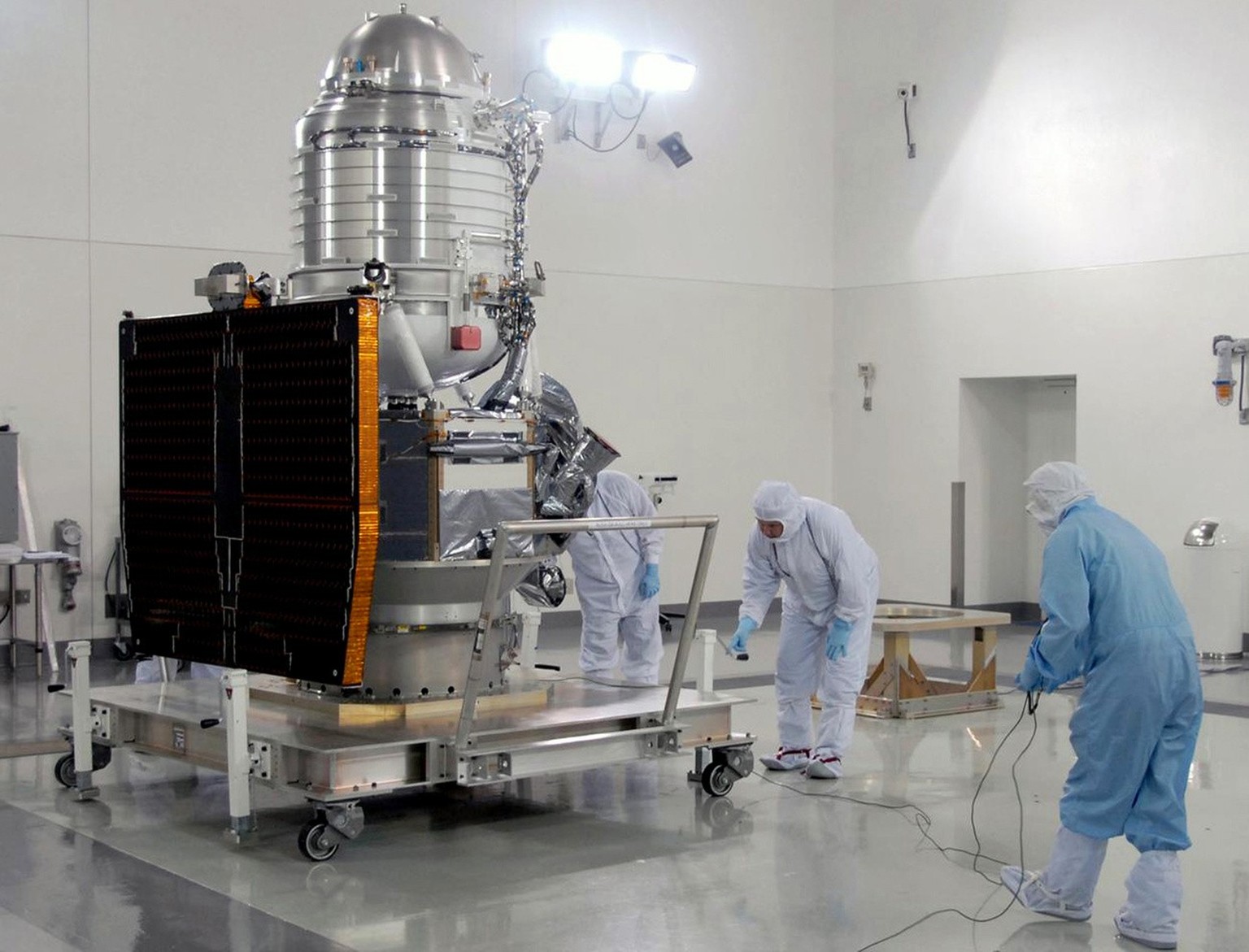 In this photo dated Aug. 17, 2009 released by NASA showing the Vandenberg Air Force Base&#039;s Astrotech processing facility in California, workers preparing NASA&#039;s Wide-field Infrared Survey Ex ...