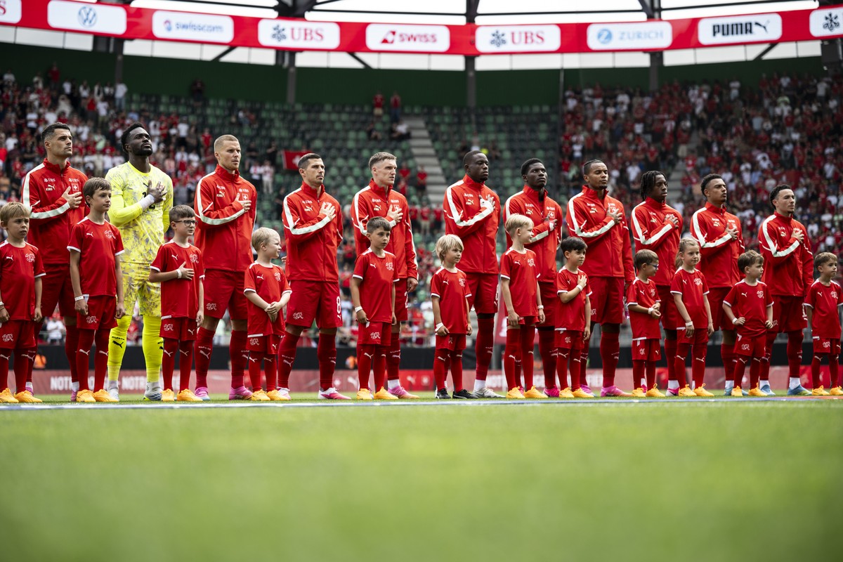 Switzerland sings the national anthem during the friendly soccer match between Switzerland and Jordan, at the kybunpark, in St. Gallen, Switzerland, Sunday, May 31, 2026. (KEYSTONE/Gian Ehrenzeller)