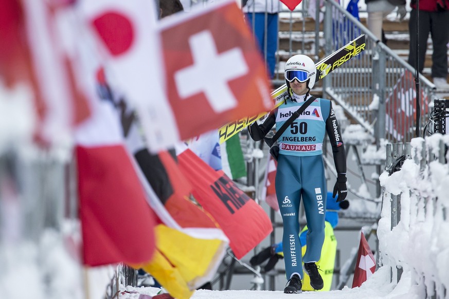 epa06395615 Simon Ammann of Switzerland reacts in the finish area during the Men&#039;s HS 140 competition at the FIS Ski Jumping World Cup in Engelberg, Switzerland, 17 December 2017. EPA/ALEXANDRA W ...