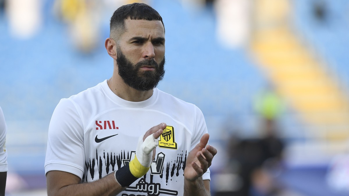 Al Ittihad's Karim Benzema greets fans during his team match against Al Raed in the Saudi Professional League, in Buraidah, Saudi Arabia, Monday, Aug. 14, 2023. (AP Photo)