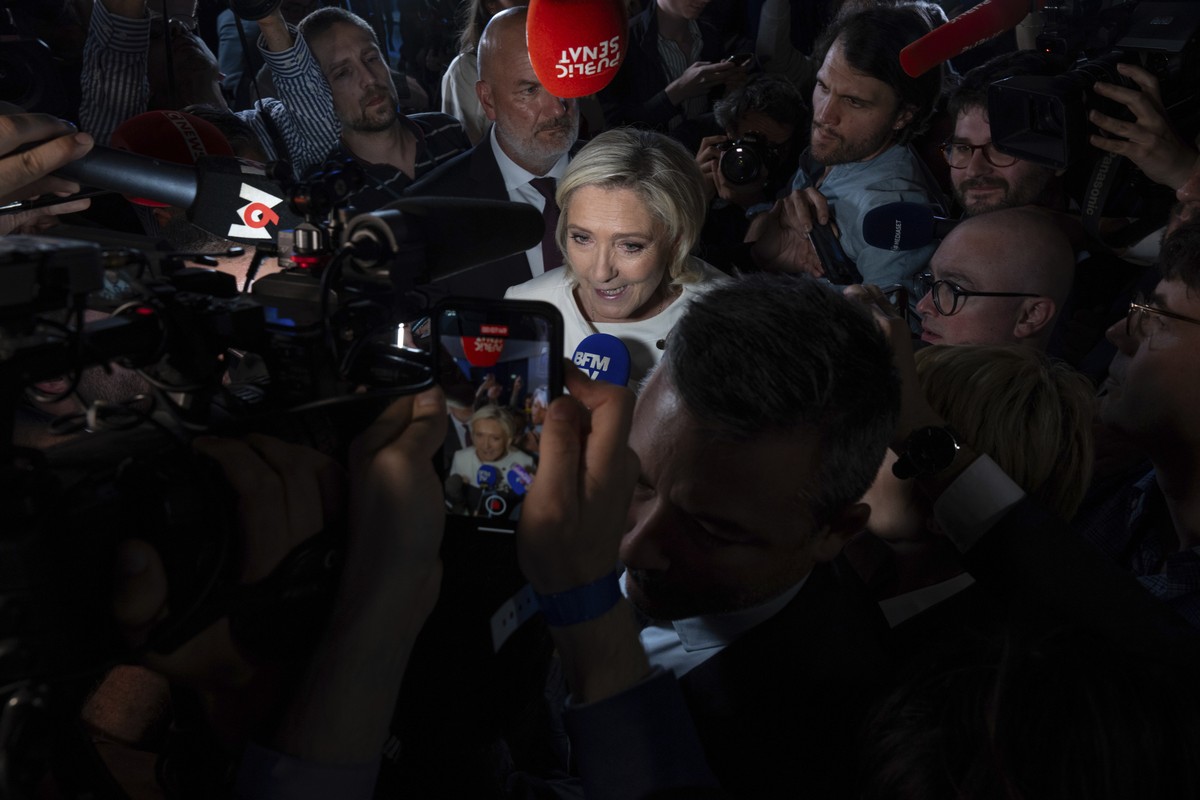 Far-right National Rally party leader Marine Le Pen answers reporters after the second round of the legislative election, Sunday, July 7, 2024, at the party election night headquarters in Paris. A coa ...